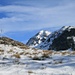 das Alpkreuz von Vorder Rüchi mit einem feinen Blick zu den Fürstein-Gipfeln
