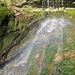 Laufenbach waterfall with a rainbow
