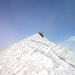 L'omone di vetta al Pioltone sommerso dalla neve.