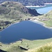 <b>Lago di Tom (2022 m).<br />Si può supporre che la sua esistenza sia stata originata da una o più doline.<br />È profondo 15 m ed ha deflusso sotterraneo.</b>