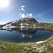 <b>Lago Scuro (2451 m) e Pizzo Taneda (2667 m).<br />Il lago ha una profondità massima di 42 m.</b>