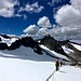 Abstieg über den nun aufgeweichten Schnee auf dem Alpeiner Ferner