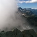Panoramica dal Corno del Camoscio 3026 mt. A sinistra il Piemonte in un mare di nubi, a destra la Valle d'Aosta a ciel sereno. Le nuvole delimitano il confine, spesso succede da questi parti.