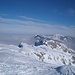 Blick nach unten und zu Strick und Tällen, im Hintergrund Schwändiliflue, Entlebucher Cerro Torre und rechts Fürstein