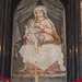 La Madonna del Ghisallo intenta ad allattare il Bambin Gesù.