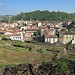 In Vienne: On the right side the restaured amphitheatre, in the foreground another unrestaured one. In the background on the left the river Rhône.