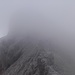 Gipfelaufbau des Hochglück verborgen im Nebel.