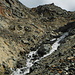 The perhaps most difficult part is where I had to cross the creek (from left to right on the picture and below the boulder in the middle of the creek).