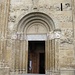 Il portale sinistro di San Michele Maggiore.