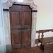 La porta della sagrestia con magnifici stipiti in marmo d'Arzo.