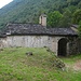 La chiesa di S.Margherita, la più antica della Valsassina (XI sec.). In primo piano la vecchia strada che portava in Valtellina.