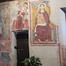 A destra la Madonna del Latte. A sinistra un martirio di Sant'Apollonia. La porta era l'ingresso originario della primitiva chiesa romanica.