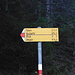Signpost in Filisur indicating the start of the trail to Muchetta.