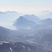 Lugano e dintorni, con la loro solita nebbiolina da inquinamento