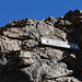 Im Aufstieg vom Refuge de l'Erco zum Monte Cinto - Ein Wegweiser mit der korsischen Schreibweise "Cintu" zeigt, dass wir hier abbiegen müssen in eine weitere Kraxelpassage...