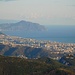 Genova con dietro il Promontorio di Portofino.
