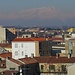 Il Monte Rosa, visto dalla torre del Bramante, emerge dalla bruma