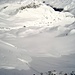 Blick vom Gipfel des Gletscher Ducan hinunter in den Gipfelsteilhang und auf den Ducangletscher, welcher soeben gerade "eingefahren" wird