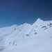 Ma quanto sei lontana ? un lungo traverso sotto la cima sulla destra che scaricava mini slavine 