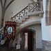 Fantasievolles Treppengeländer in einer Seitenkapelle.