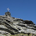 The cross at the summit of Piz Scalotta.