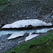 Last remains of avalanche snow in the river.