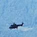 L'elicottero operante in prossimità dell'arrivo della funivia del Monte canin.