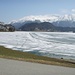 Il lago di St. Moritz in fase di disgelo e sullo sfondo Muottas Muragl