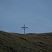 Schon bald ist - mit kräftigem Zoom - das Gipfelkreuz meines Zieles zu sehen. Bis dahin ist es aber noch ein ordentliches Stück.
