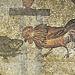 Il gallo che affronta il rospo, ossia la lotta fra il bene ed il male.