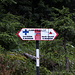 Valea Rea - Ein Wegweiser zeigt auch "unsere" Route an: Über Portiţa Viştei soll es zum Vârful Moldoveanu gehen. Der Weg ist mit roten Dreiecken markiert.