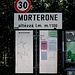 Oltre la galleria la strada scende verso Morterone; fino a pochi anni fa, con 33 abitanti, era il comune più piccolo d’Europa. Ora il primato gli è stato sottratto da Padesina, in provincia di Sondrio.