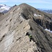 Chrstian steigt der ersten richtigen Kletterstelle entgegen. Hinten ist der Arpelistock (3035,5m).