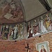 Nell'abside si trovano degli affreschi di mano di Giovanni da Milano del 1410, raffiguranti Sant'Antonio Abate, il Battesimo di Cristo e la Madonna fra i Santi con un prevosto orante. 
