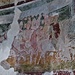 Nella parte bassa dell'abside centrale si trovano gli affreschi più peculiari: due gruppi di cavalieri che si inseguono, del gruppo di dieci inseguitori faceva parte anche una figura femminile vestita di rosso.