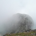 Der in Wolken gehüllte Trois Mamelles East Peak.