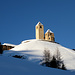 Kirche von Lohn mit der letzten Sonne