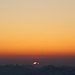 Ein unbekannter Gipfel (Alvier?) zeichnet die aufgehende Sonne