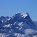 Magerrain (2523,7m): Gipfelaussicht vom höchsten Berg der Spitzmeilenfruppe zum höchsten Berg des Kanton Glarus: Tödi - Piz Russein (3614m). Schön ist hier auch der Nebengipfel vom Glarner Tödi (3574m) auf dem Gletscherplateau zu sehen. Links auf dem Foto ist zudem der Piz Urlaun (3359m), rechts der spitzige Chli Tödi / Crap Glaruna (3076m).