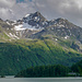 La Margna in all its glory. The regular route follows the trail above the lake, disappears out of the frame, and attends the north-east ridge from behind, at P.2980. I once took a shorter way directly through Murtairac (the valley half filled with snow between the north-east and north-west ridge), to reach the lowest gap on the north-east ridge left of P.2980. Another time, when the conditions were just right, we climbed through the 'canale nord' - the couloir that leads straight to the summit. 