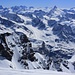 Das wahnsinnige Gipfelpanorama der Walliser Berge vom Grand Combin de Grefeneire (4314m).

Besonders auffällig sind Weisshorn (4506m), Dent Blanche (4357m), Dom (4545,4m), Täschhorn (4490,7m), Alphubel (4206m), Rimpfischhorn (4198,9m) und Dufourspitze (4633,9m).

Vor der dem Weisshorn ist die schneidige La Ruinette (3875,0m). Rechts unten am Bildrand ist der auffällige Tour de Boussine (3833m).