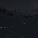 Die Milchstrasse und das Sternbild Schütze leuchten über dem Grand Combin (4314m). Anwärter auf den Gipfel sind im Aufstieg und queren den Glacier de Corbassière.