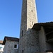 Il complesso monumentale di San Nicola con la torre, oggi campanile, il cui ingresso posto a 150 cm di altezza rivela l'origine militare dell'edificio.