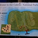 Plan vom 5,31km² grossen Carbits Nationalpark auf einer Halbinsel nordwestlich von Portsmouth. Der Park wurde 1986 gegeründet und wartet mit tropischem Trockenwald, Korallenriffen, Feuchtgebiete und dem historischen Port Shirley auf. Der Park und die historischen Anlagen sind UNESCO Weltkulurerbe.