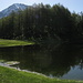 il piccolo laghetto situato ai Roccoli Lorla,qui vi è anche una fontana con acqua fresca,alle spalle il monte Legnone