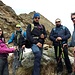 Our team before the final jump to Pizzo Marona; the summit chapel is visible. (photo Massimo) 
