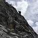 Nico im Einstieg zur schwierigsten Stelle des Klettersteigs