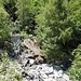 Zerstörte Brücke am Tracciolino-Trail im Val Revelaso