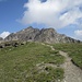 auf dem flachen Gipfel des Piz Clünas mit Blick zum Piz Minschun, dessen eigentlicher Gipfel von hier aber noch nicht sichtbar ist