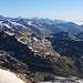 Basòdino (3272,4m): Aussicht vom Gipfel zu den Urner Alpen mit Galenstock (3586m), Dammastock / Winterberg (3630,3m), Sustenhorn (3503m) und Fleckistock (3416,5m). Vor dem Sustenhorn ist der Pizzo Rotondo (3192,0m). Ganz vorne links steht das Marchhorn (2962,0m), rechts im Bild sind Pizzo Cavagnöö (2836,6m) und Poncione di Valleggia (2873m)